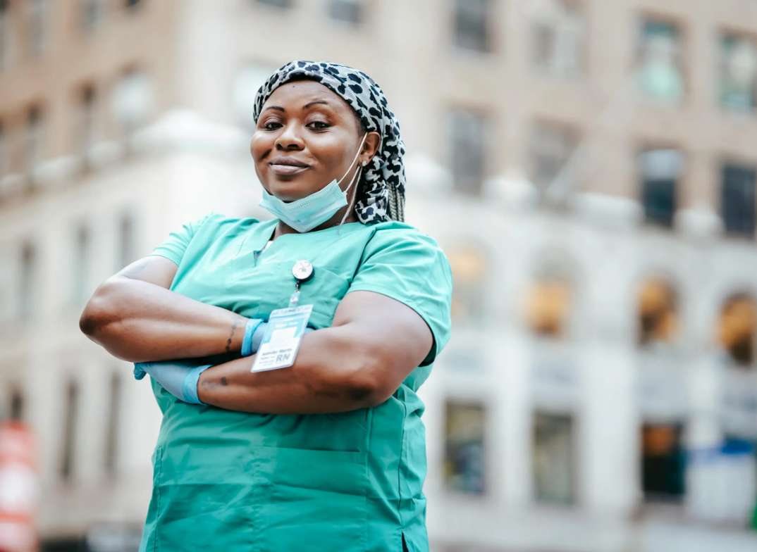 Nurse in teal scrubs