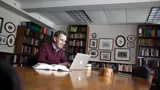 Professor David Carr reads books