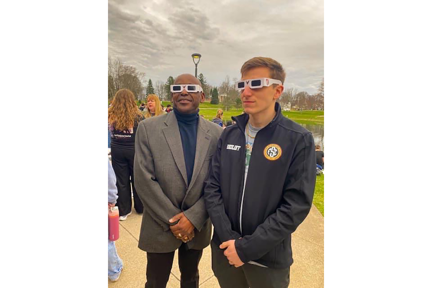 Pres Hayles And Student Mikhail Sokoloff In Eclipse Glasses